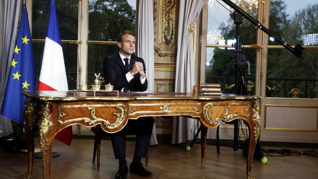 Emmanuel Macron making his speech on television from the Elysee Palace, Paris.