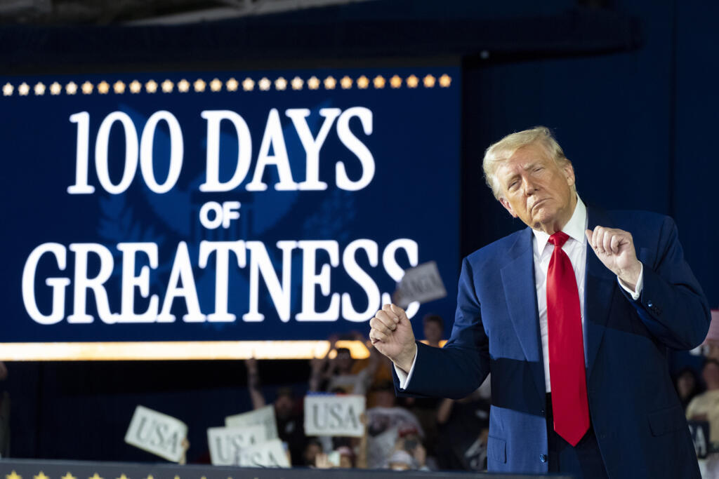 President Donald Trump arrives to speak on his first 100 days at Macomb County Community College Sports Expo Center, Tuesday, April 29, 2025, in Warren, Mich.