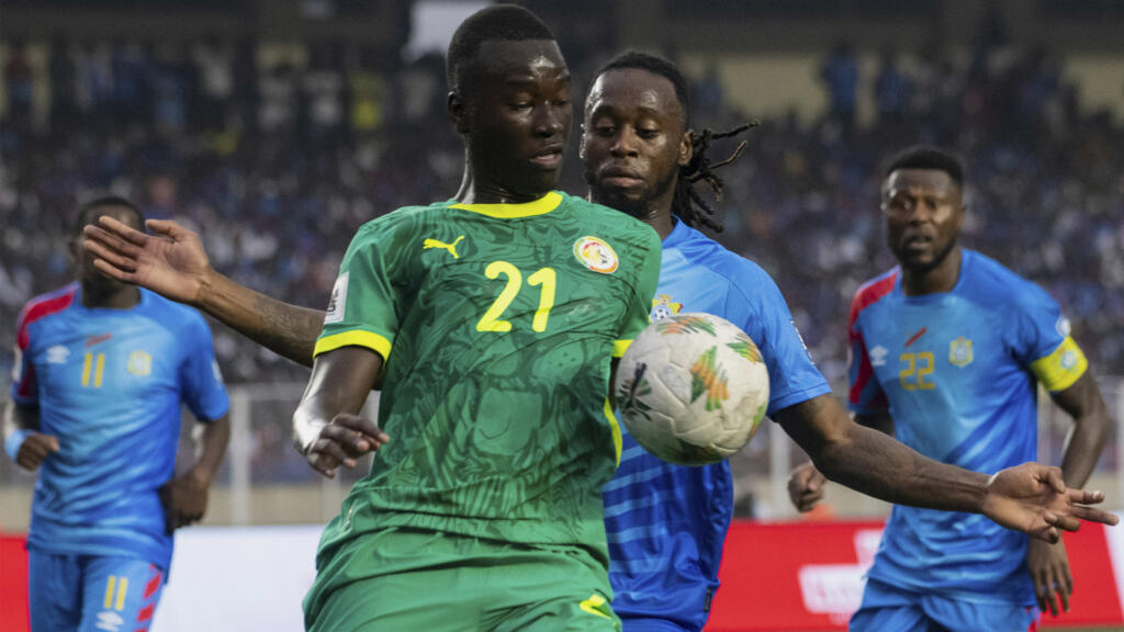 Pape Gueye (Sénégal) et Aaron Wan-Bissaka (RDC), le 9 septembre 2025.