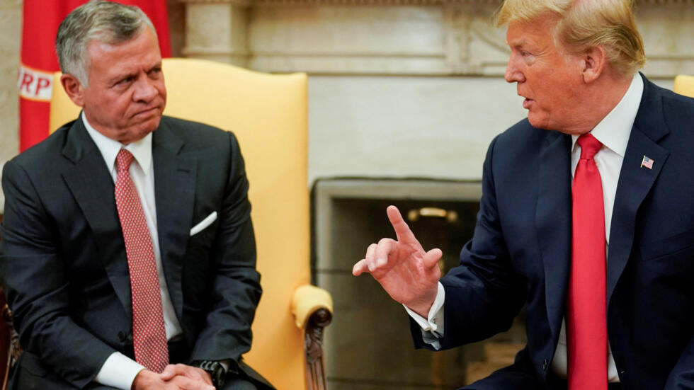 U.S. President Donald Trump talks with Jordan’s King Abdullah during a meeting in the Oval Office of the White House in Washington, U.S., June 25, 2018.