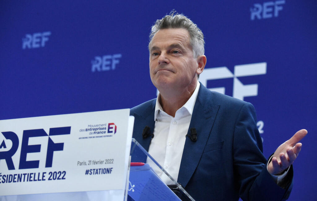 French Communist Party (PCF) presidential candidate Fabien Roussel gives a speech as he presents his economic campaign program to the French employers' association Medef in Paris on February 21, 2022.