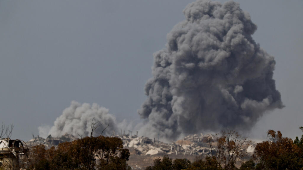 Smoke rises after an explosion in Gaza, as seen from the Israeli side of the Israel-Gaza border, July 29 2025.