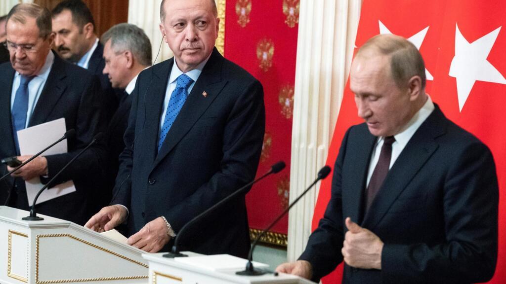 Russian President Vladimir Putin and Turkish President Tayyip Erdogan attend a news conference following their talks in Moscow, Russia March 5, 2020.