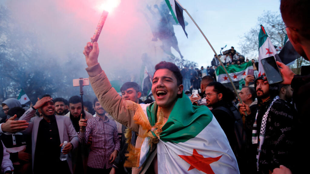 Syrians living in Turkey celebrate the ousting of President Bashar al-Assad, Istanbul, 8 December 2024.