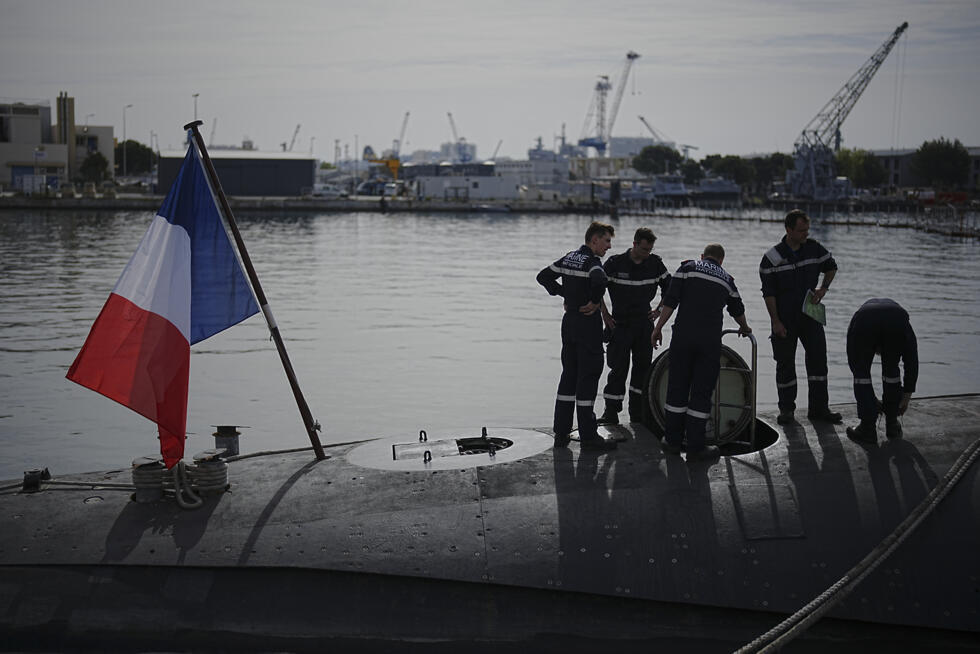 France Nuclear Submarine Sailors prepare a French Rubis-class submarine at the Toulon naval base in southern France, Monday, April 15, 2024. The nuclear powered submarine will be guarding France's Cha