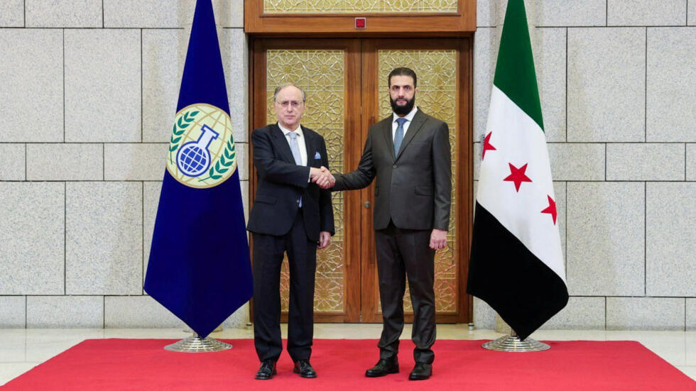 Syria's interim President Ahmed al-Sharaa meets with Fernando Arias, the head of the Organisation for the Prohibition of Chemical Weapons (OPCW) in Damascus, Syria, in this handout released on Februar