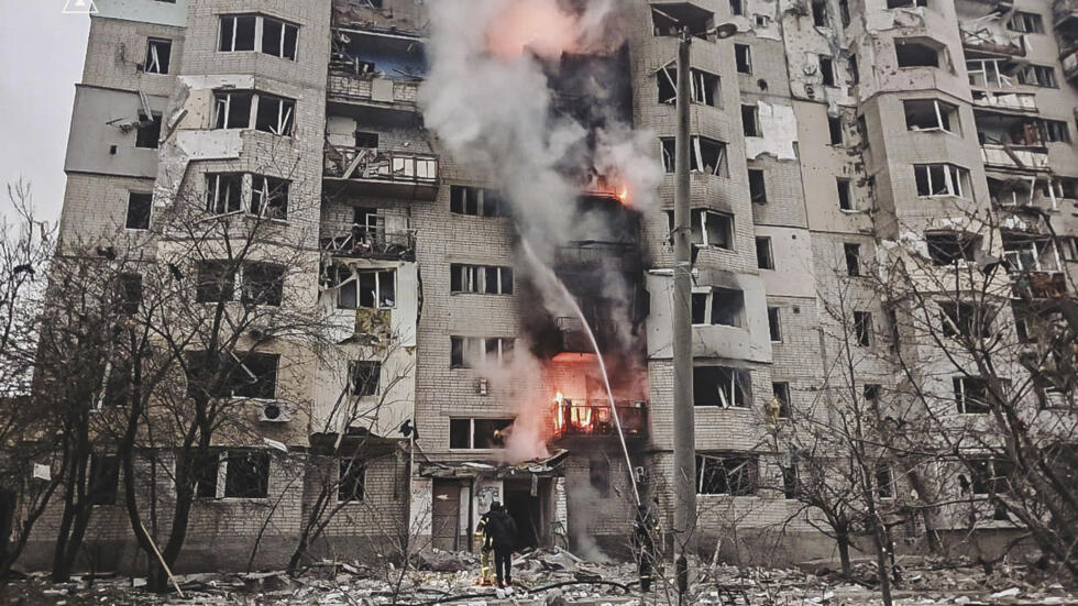In this photo provided by the Ukrainian Emergency Service, firefighters put out a fire at an apartment building following Russia's attack in Kupyansk, Kharkiv region, Ukraine, Sunday, April 6, 2025.