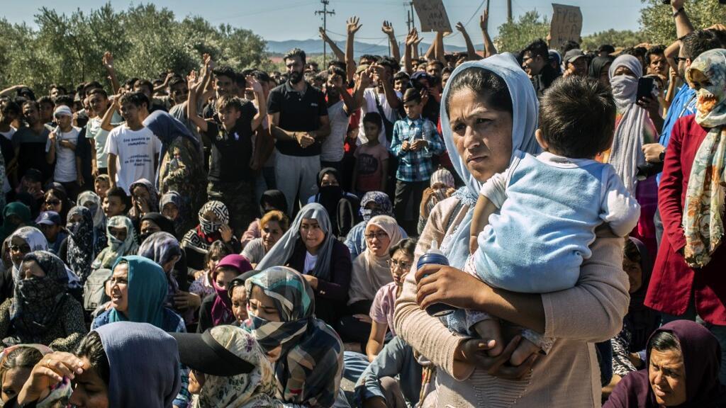 Les migrants du camp de Moria sur l'île de Lesbos, lors d'une manifestation, pour dénoncer leurs conditions de vie, le 1er octobre 2019.