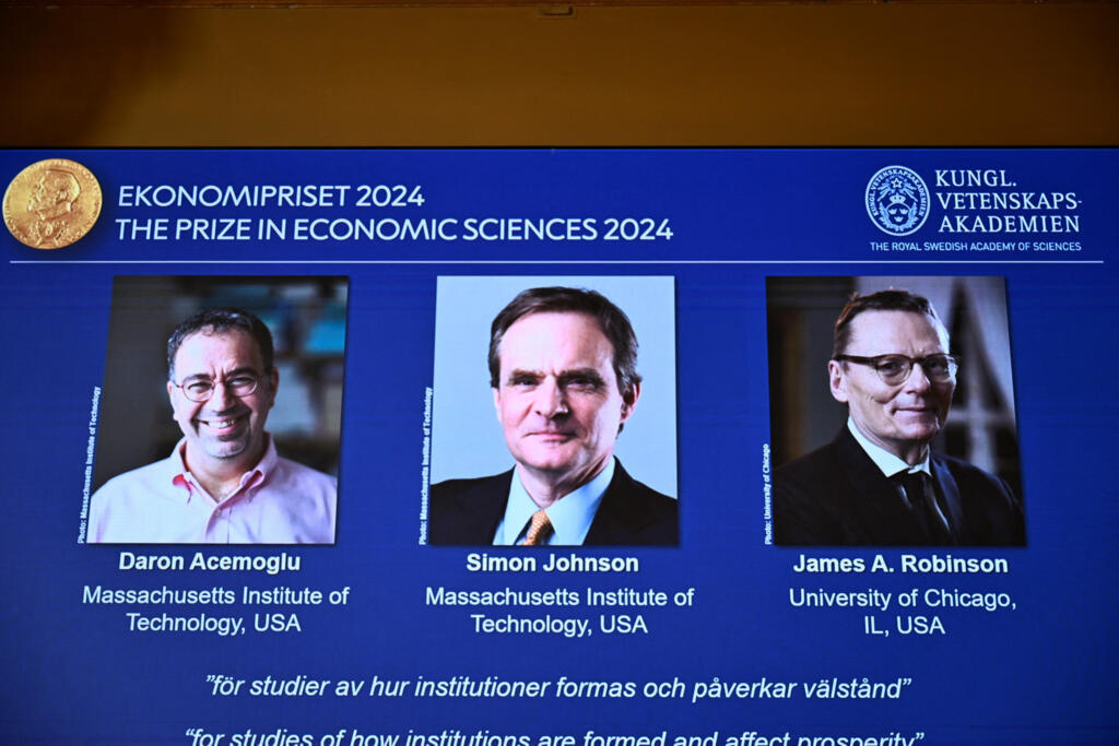 Academy of Sciences permanent secretary Hans Ellegren, Jakob Svensson and Jan Teorell, of the Nobel Assembly at the Swedish Riksbank announces the Swedish Riksbank's prize in economic science in memor