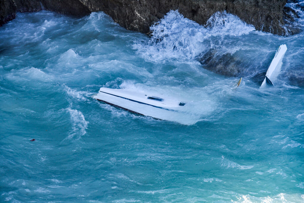 Debris of a boat which sank off Cythera Island, on 6 October. At least 18 people died when two migrant vessels sank in gale force winds off the Greek coast.