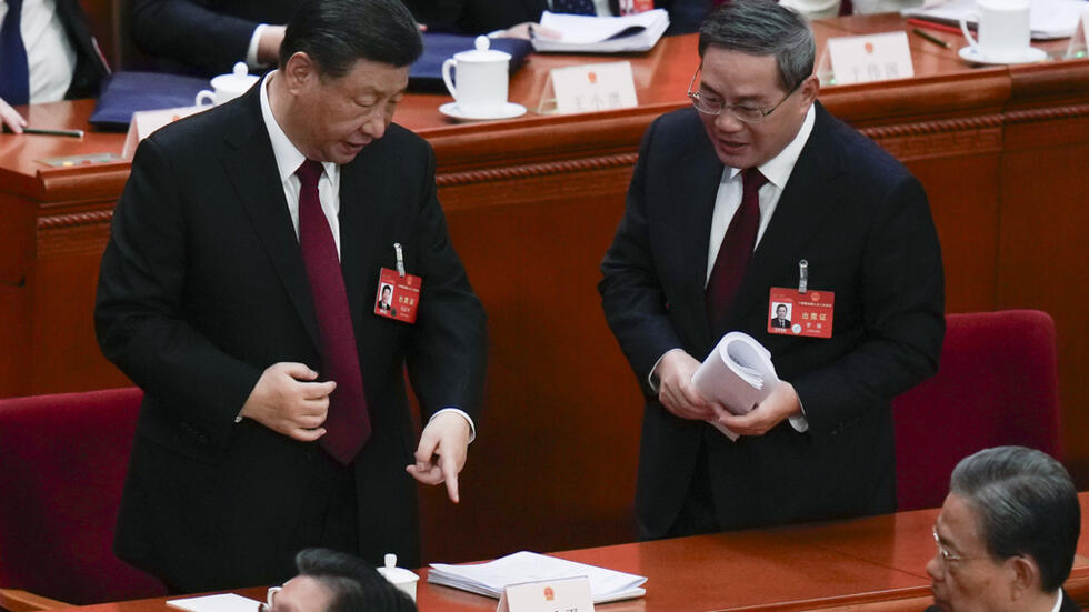 Presedintele chinez Xi Jinping si premierul sàu Li Qiang, dupà deschiderea sesiunii anuale a Adunàrii nationale populare. Beijing, 5 martie 2024.