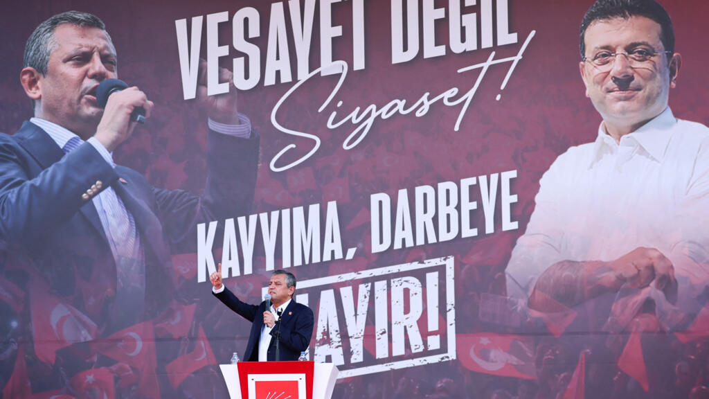 Leader of Turkey's main opposition Republican People's Party (CHP), Ozgur Ozel, speaks on stage during a rally in Ankara on 14 September 2025.