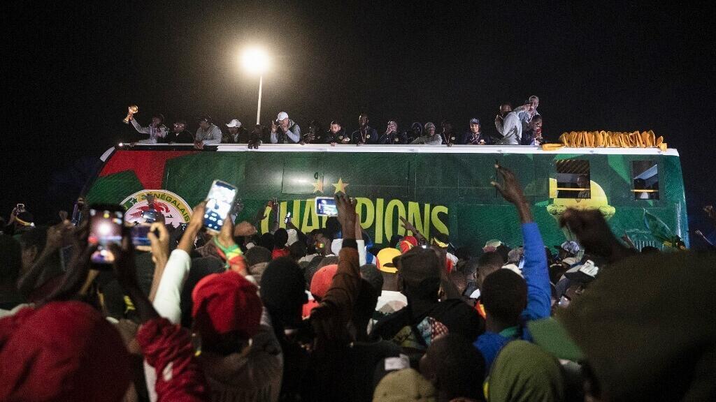 CAN 2025: auréolés d'une deuxième étoile, les Lions de la Teranga font un retour triomphal au Sénégal