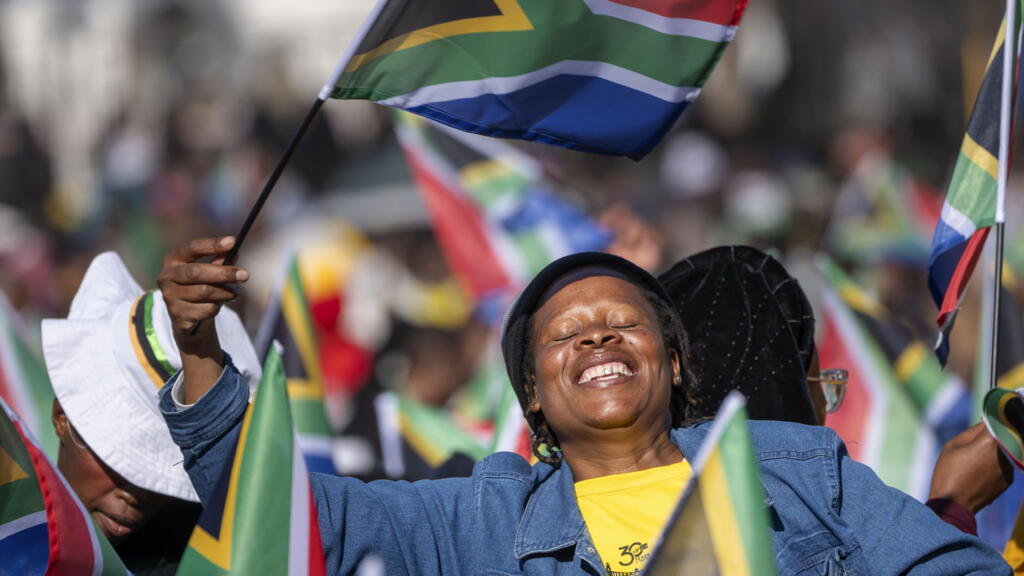 South Africans in Pretoria celebrate inauguration of Cyril Ramaphosa as president on 19 June 2024.