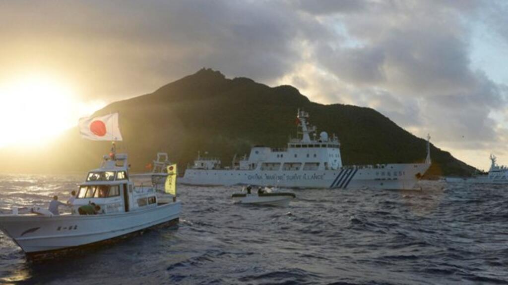 Ảnh minh họa: Tàu Trung Quốc (G) chạm trán với tuần duyên Nhật gần đảo Uotsuri, thuộc quần đảo Senkaku/Điếu Ngư, biển Hoa Đông, ngày 01/07/2013.