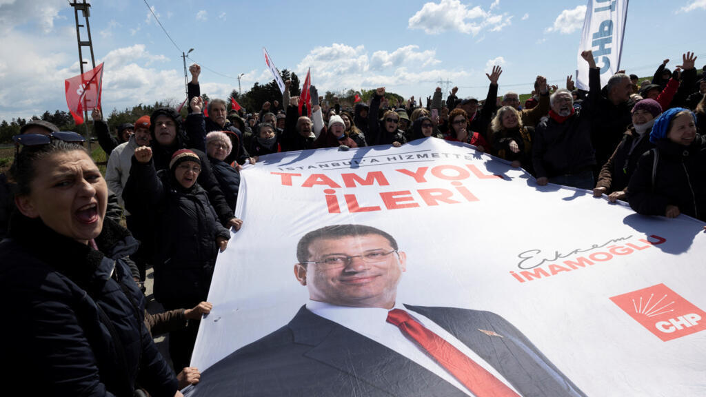 Supporters of Ekrem Imamoglu protest outside the prison where he is being held on 11 April, 2025. 