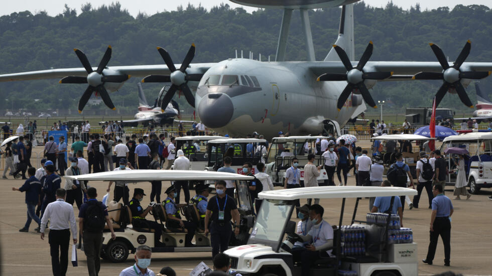Visitors look at the Chinese military's KJ-500 airborne early warning and control aircraft during 13th China International Aviation and Aerospace Exhibition, also known as Airshow China 2021, on Wedne