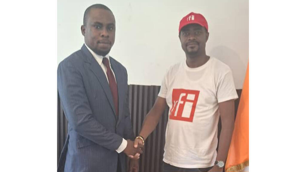 Le président du Club RFI Abidjan et le cousin Landry N'dah Pierre Mideh.