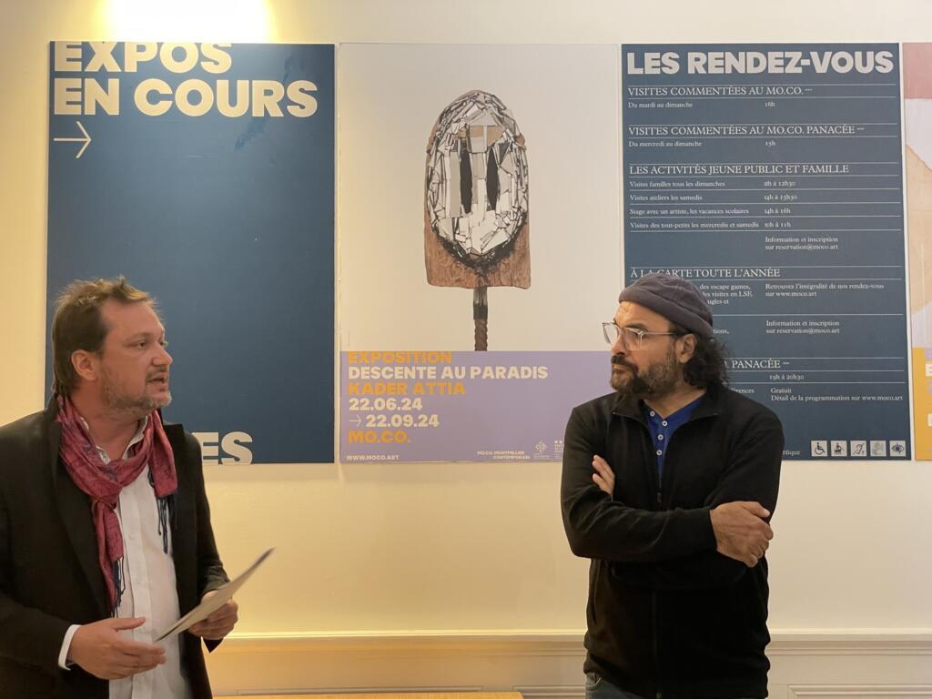 French-Algerian artist Kader Attia with the curator of Montpellier's Mo.Co art museum at the opening of his exhibition "Descent into Paradise", on 21 June 2024.