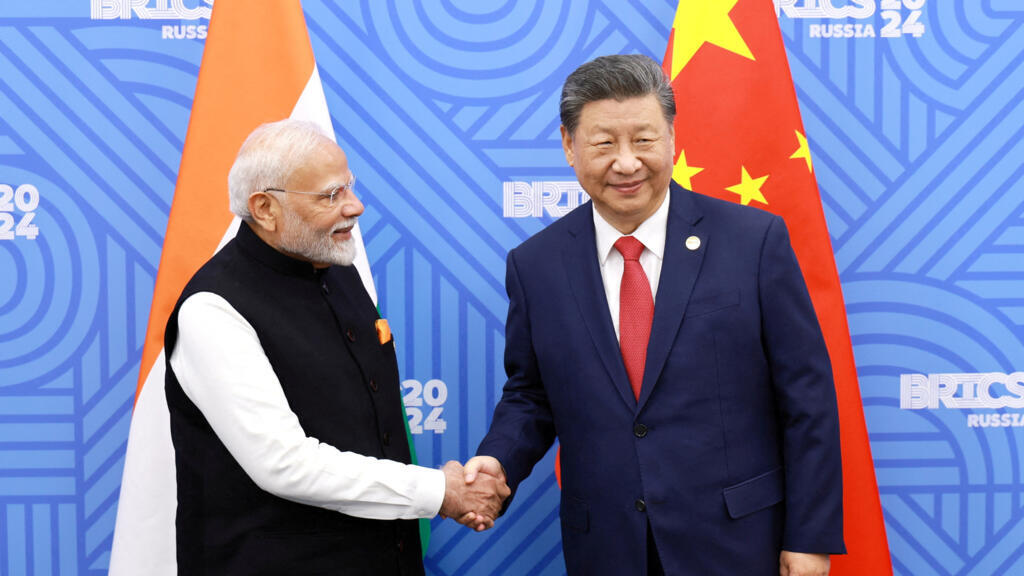 Chinese President Xi Jinping and India Prime Minister Narendra Modi meet on the sidelines of the BRICS summit in Kazan, Russia October 23, 2024.