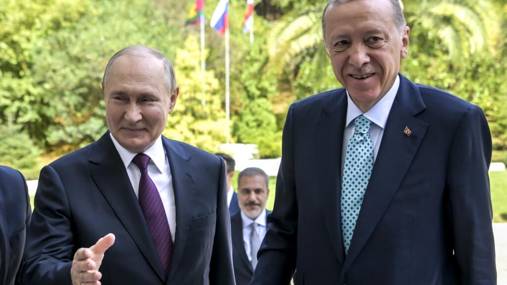 Russian President Vladimir Putin, left, welcomes Turkish President Recep Tayyip Erdogan for the talks at Russia's Black Sea resort of Sochi, Russia, Monday, 4 September 2023.