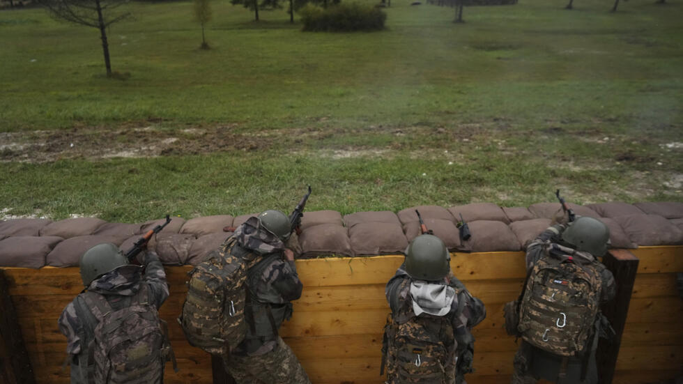 Ukrainian soldiers train at a military camp in eastern France, Wednesday, Oct. 9, 2024.