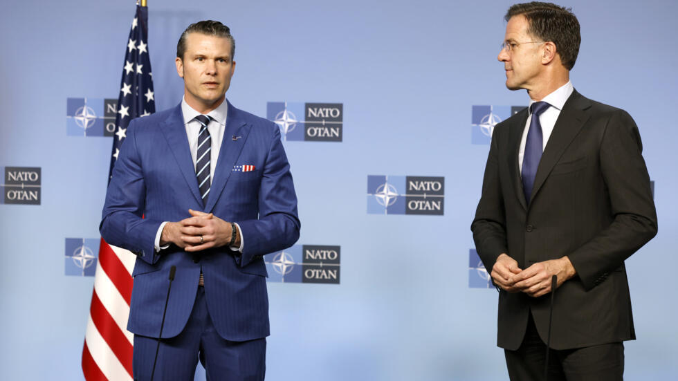 NATO Secretary General Mark Rutte, right, and United States Secretary of Defense Pete Hegseth address a media conference during a meeting of NATO defense ministers at NATO headquarters in Brussels, Th