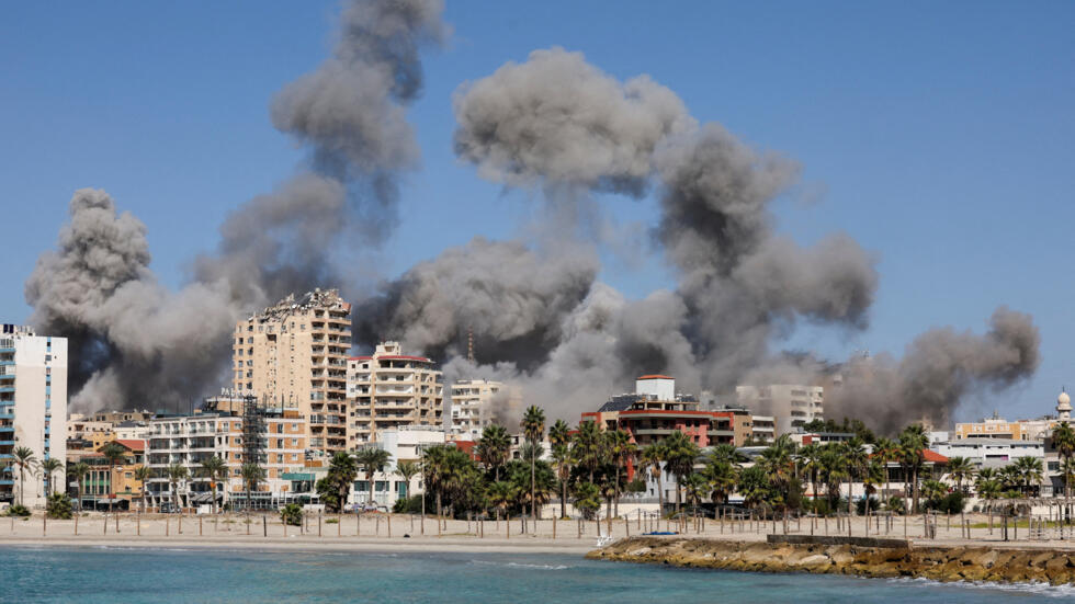 Smoke billows after an Israeli strike, amid the ongoing hostilities between Hezbollah and Israeli forces, in Tyre, southern Lebanon, October 23, 2024.
