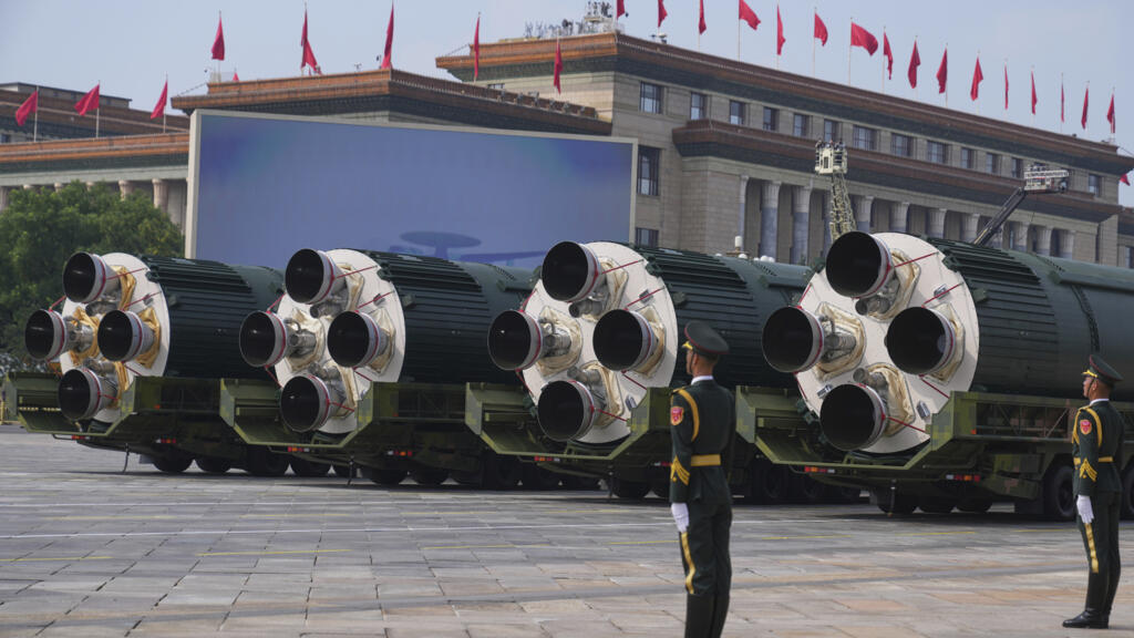The DF-5C liquid-fueled intercontinental strategic nuclear missiles take part in a military parade to commemorate the 80th anniversary of Japan's World War II surrender held in front of Tiananmen Gate