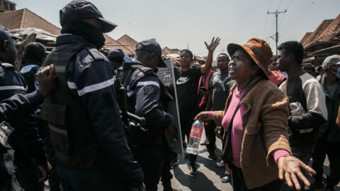Protesters face security forces as they demonstrate against repeated water and electricity outages in Antananarivo, Madagascar, on 25 September 2025. 