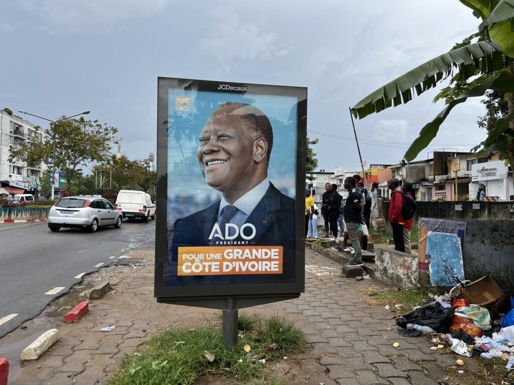 Poster for Alassane Ouattara's RHDP campaign in Cocody, Abidjan, Côte d'Ivoire, seen on 11 October 2025.