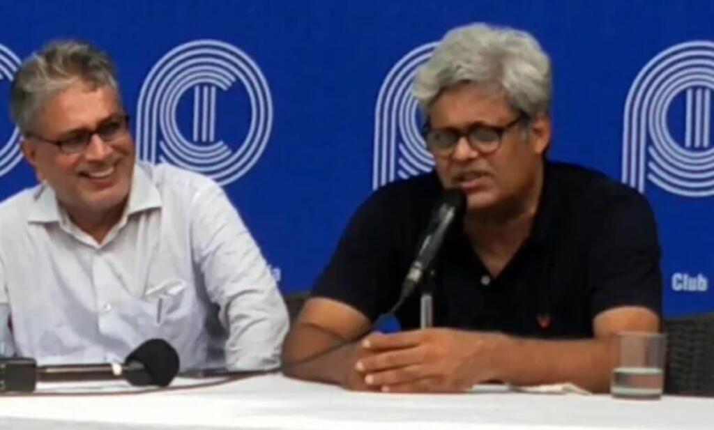 M K Venu of Wire addressing journalists at the Press Club of India.