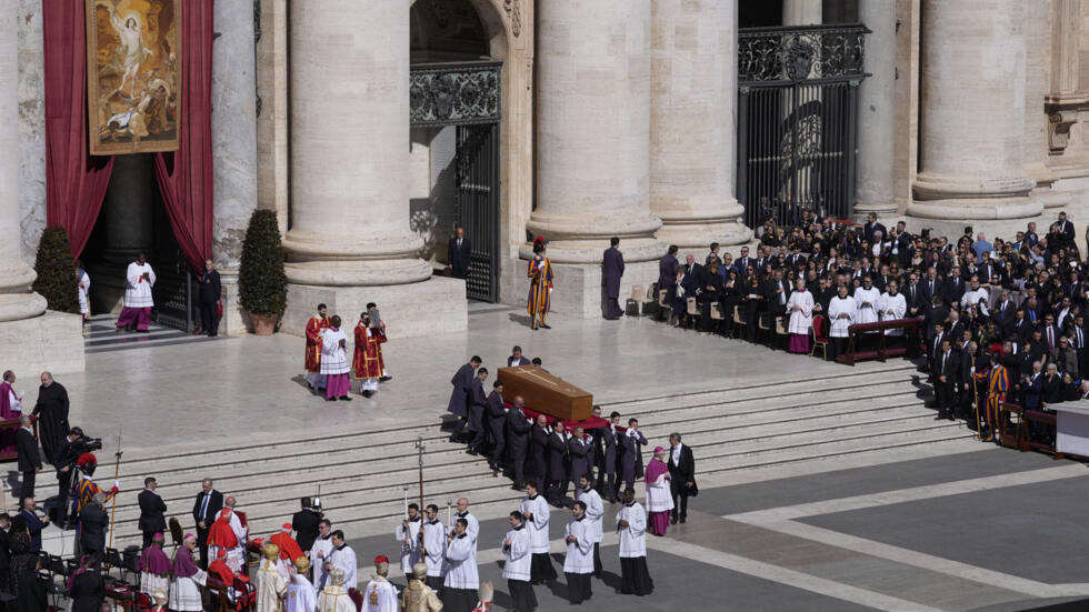 Vatican PopeThe coffin of Pope Francis is carried into St Peter's Square for his funeral, at the Vatican, Saturday, April 26, 2025. (AP Photo/Gregorio Borgia)