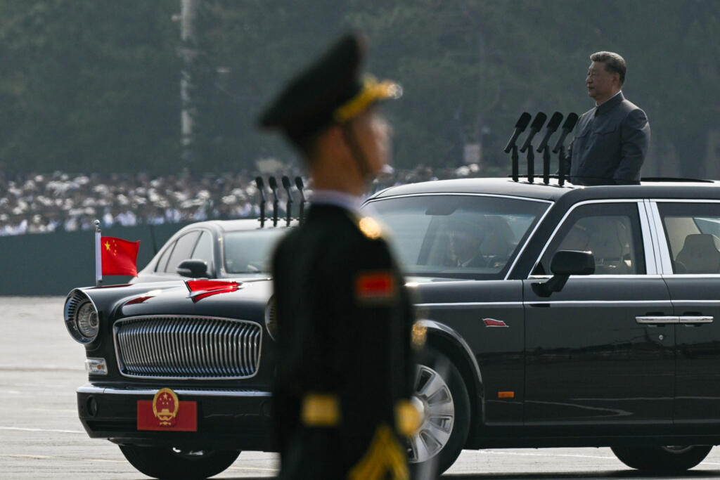 China's President Xi Jinping starts his inspection of the troops during a military parade in Beijing’s Tiananmen Square