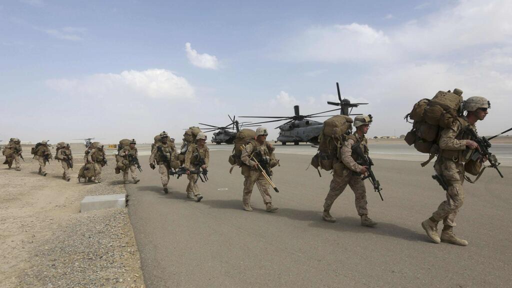 Des soldats américains se préparent à leur départ de leur base du Helmand, en octobre 2014.