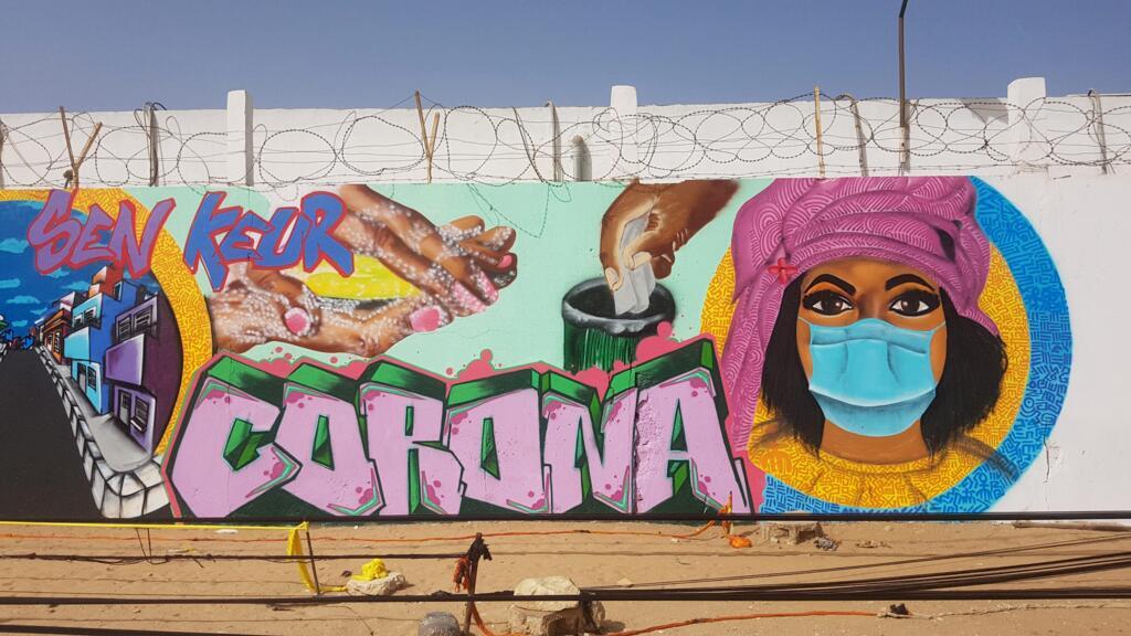 fresque murale de sensibilisation, lutte contre le Covid-19 au Sénégal.