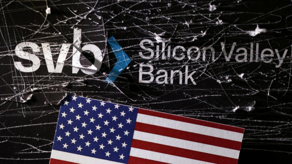 Destroyed SVB (Silicon Valley Bank) logo and U.S. flag is seen in this illustration taken March 13, 2023.