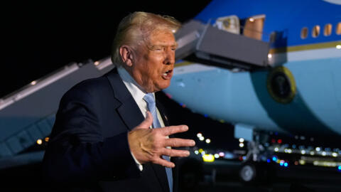 President Donald Trump speaks to reporters before boarding Air Force One at Palm Beach International Airport in West Palm Beach Fla., on his way back to the White House, Sunday, Nov. 16, 2025.