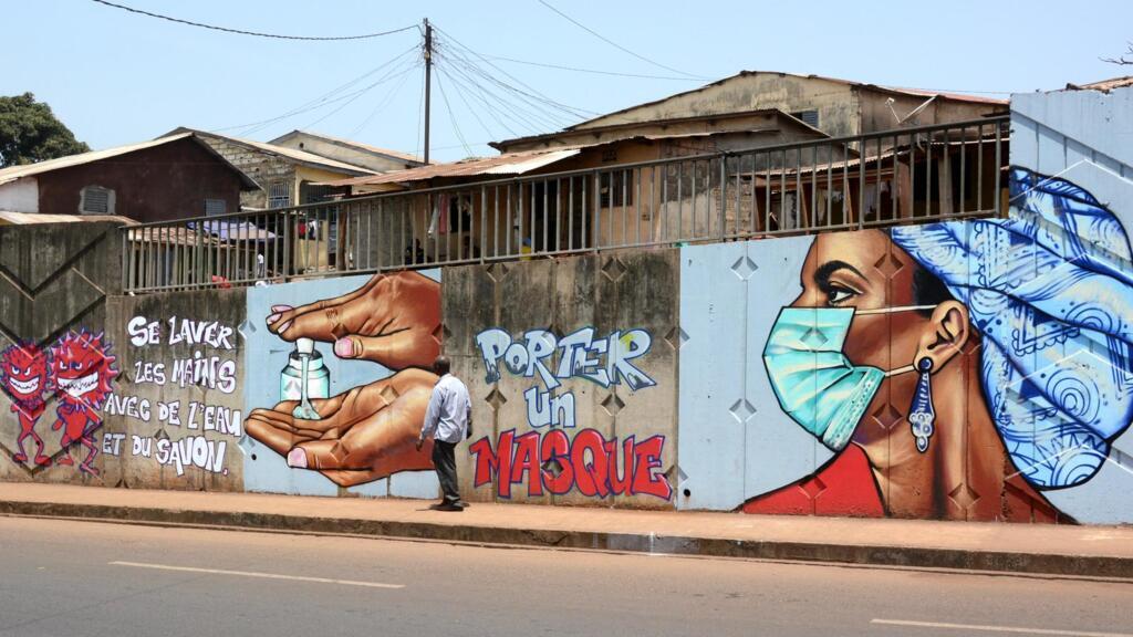 Graffiti de prévention contre le coronavirus à Conakry.