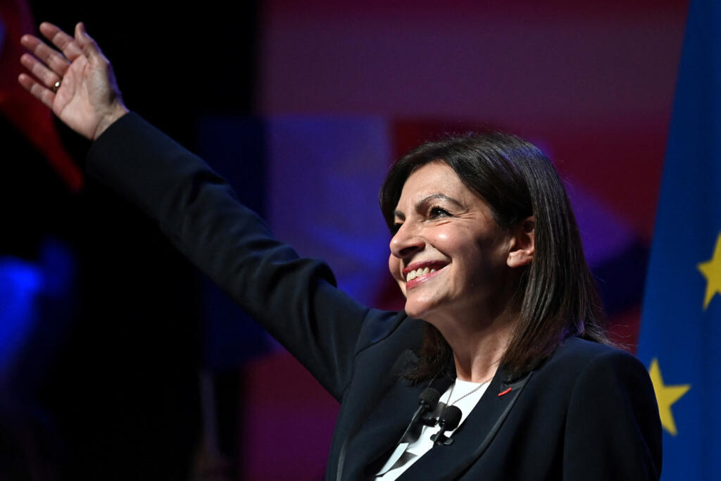 Paris' mayor and French Socialist Party (PS) candidate for the April 2022 presidential election Anne Hidalgo waves at supporters during a campaign meeting in Perpignan on December 12, 2021.