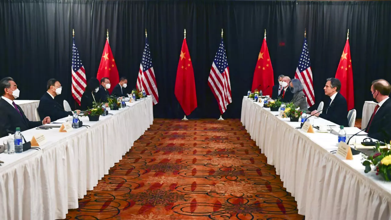 Secretary of State Antony Blinken, second from right, joined by national security adviser Jake Sullivan, right, speaks during the opening session of US-China talks with Chinese Communist Party foreign affairs chief Yang Jiechi, and China's State Councilor Wang Yi, at the Captain Cook Hotel in Anchorage, Alaska, Thursday, March 18, 2021. (Frederic J. Brown/Pool via AP)