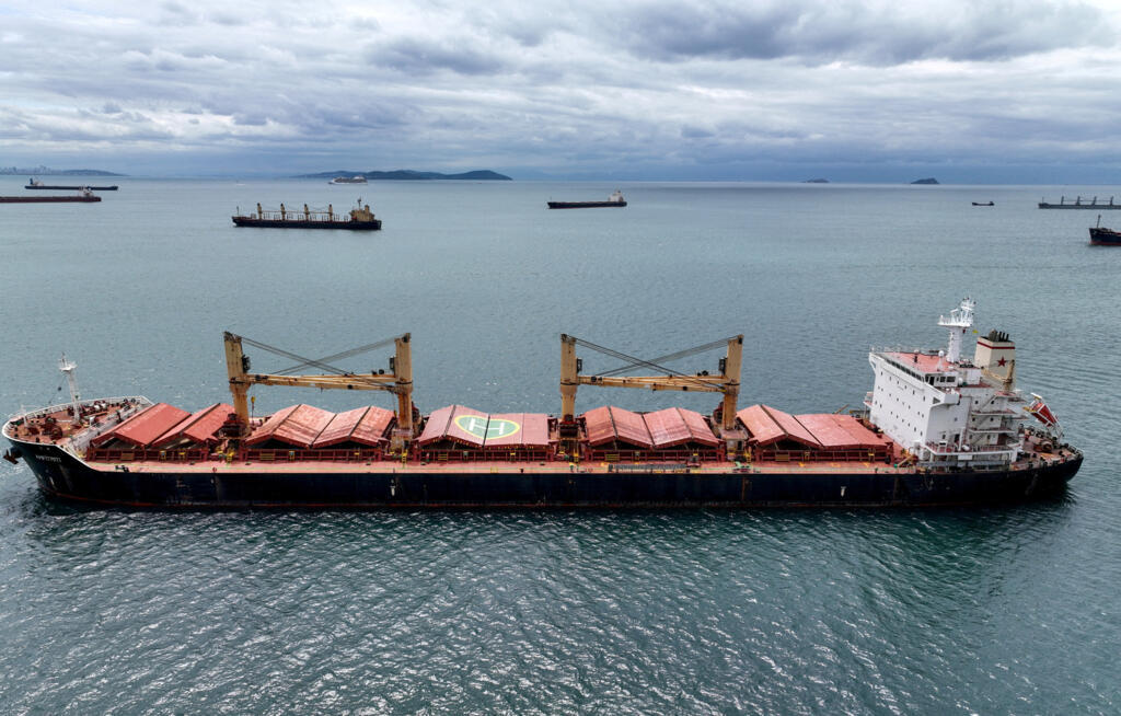 Amfitriti, a bulk carrier part of the Black Sea grain deal, and other commercial vessels wait to pass the Bosphorus strait off the shores of Yenikapi in Istanbul, Turkey, on May 10, 2023.