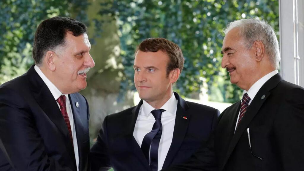 French President Emmanuel Macron hosts Libyan Prime Minister Fayez al-Sarraj and opponent General Khalifa Haftar in Paris, 2017