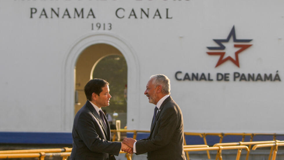 U.S. Secretary of State Marco Rubio and Panama Canal Authority Administrator Ricaurte Vasquez shake hands after touring the Miraflores Locks at the canal in Panama City, Feb. 2, 2025.