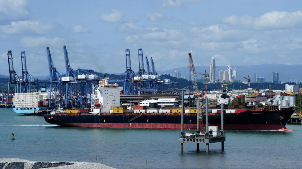 A ship sails near the Balboa Port after Hong Kong's CK Hutchison Holdings Ltd 0001.HK agreed to sell its interests in a key Panama Canal port operator to a BlackRock Inc-backed consortium, amid pressu