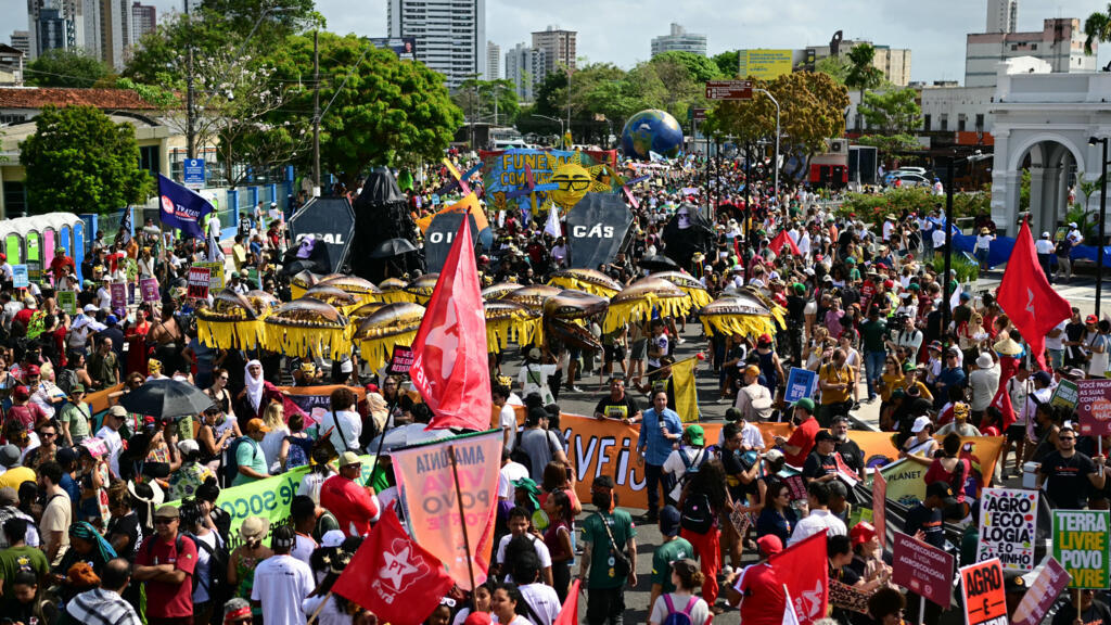 Climate protesters rally in Brazil at COP30 halfway mark