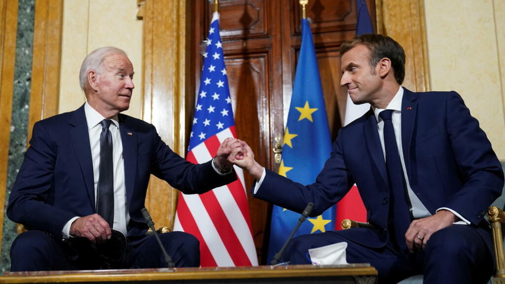 French President Emmanuel Macron (R) and his US counterpart Joe Biden attend a bilateral meeting at the French Embassy at the Vatican on October 29, 2021 in Rome.
