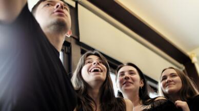 Ukrainian students (L-R) Roman Koval, Karyna Myshnova, Anna Fursyk and Alina Kuprii take a selfie during an interview with AFP at Tunghai University in Taichung, Taiwan