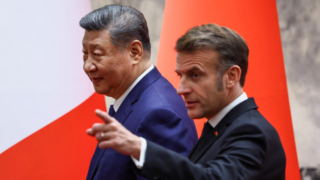 French President Emmanuel Macron gestures next to Chinese President Xi Jinping following a signing ceremony for agreements and contracts at the Great Hall of the People in Beijing as part of a three-day visit to China, December 4. 2025. French President Emmanuel Macron gestures next to Chinese President Xi Jinping following a signing ceremony for agreements and contracts at the Great Hall of the People in Beijing as part of a three-day visit to China, December 4. 2025.