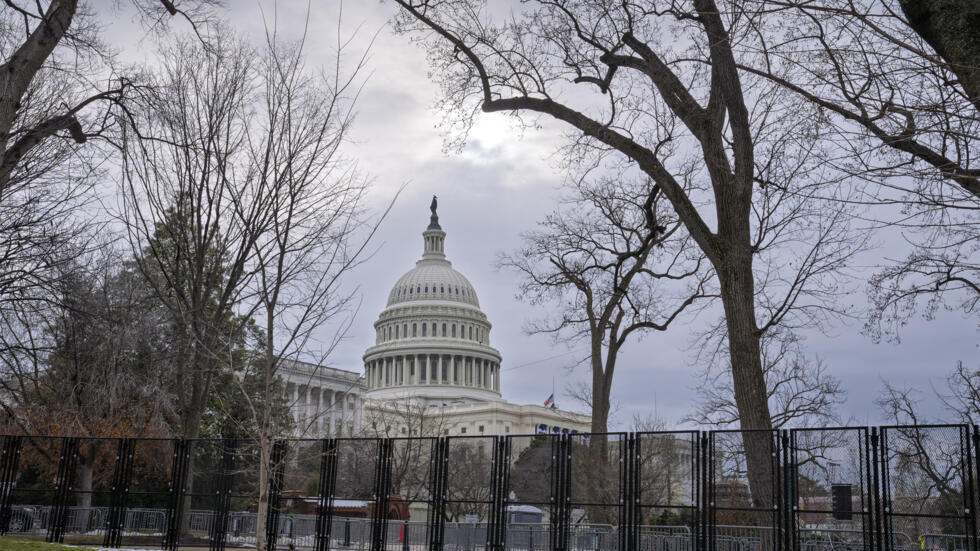 Protective fencing surrounds the Capitol as preparations continue for Inauguration Day, Saturday, Jan. 18, 2025, in Washington.